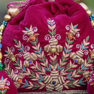 Royal Wine Velvet Potli Bag with Intricate Zari & Multicolor Thread Embroidery with Beaded Tassel Detailing (Luxury Ethnic Clutch)