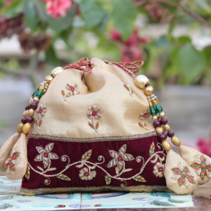 Royal Beige & Maroon Velvet Potli Bag with Intricate Zari Floral Embroidery & Multicolor Bead Tassel Detailing (Luxury Ethnic Clutch)